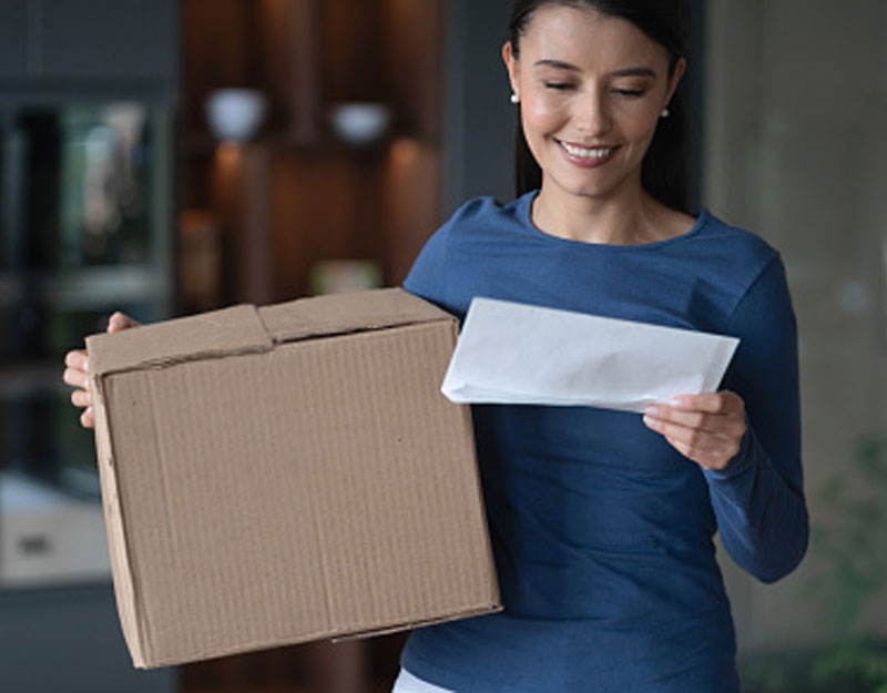 Woman holding shipping order