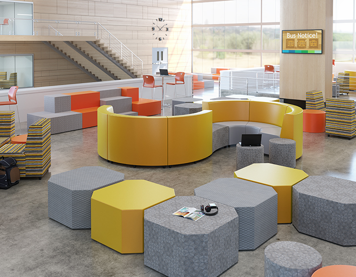 Large bright commons area with wavy and square seating.